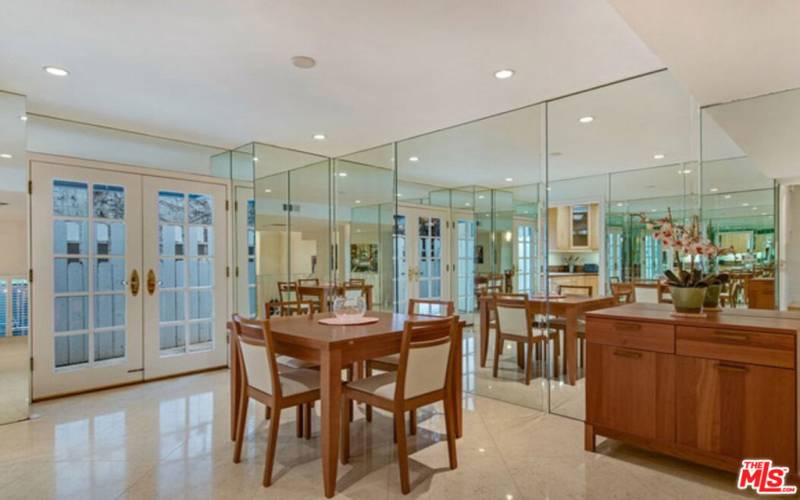 DINING ROOM WITH SMALL PATIO BEHIND