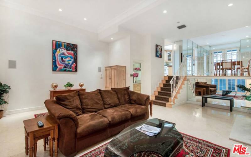 LIVING ROOM WITH DINING ABOVE