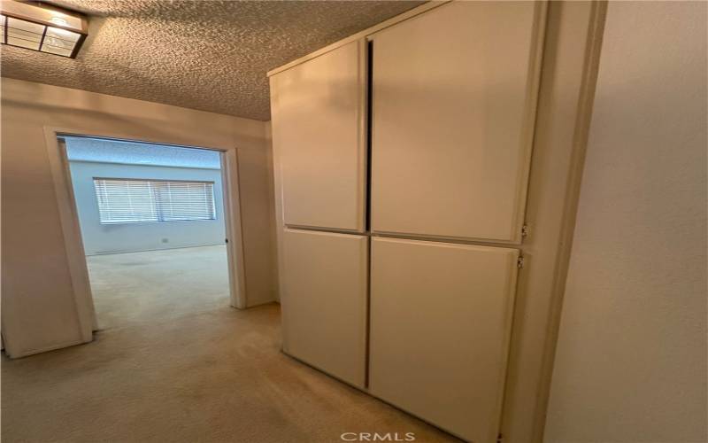 Hallway with closets