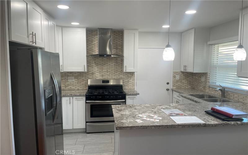 Full Kitchen View with Fridge