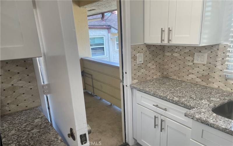 Back door through kitchen to garage