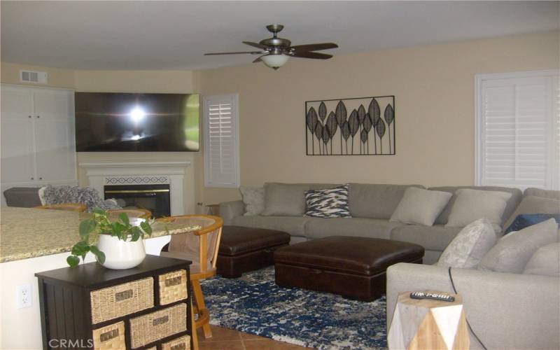 Family Room Includes Ceiling Fan and Fireplace.