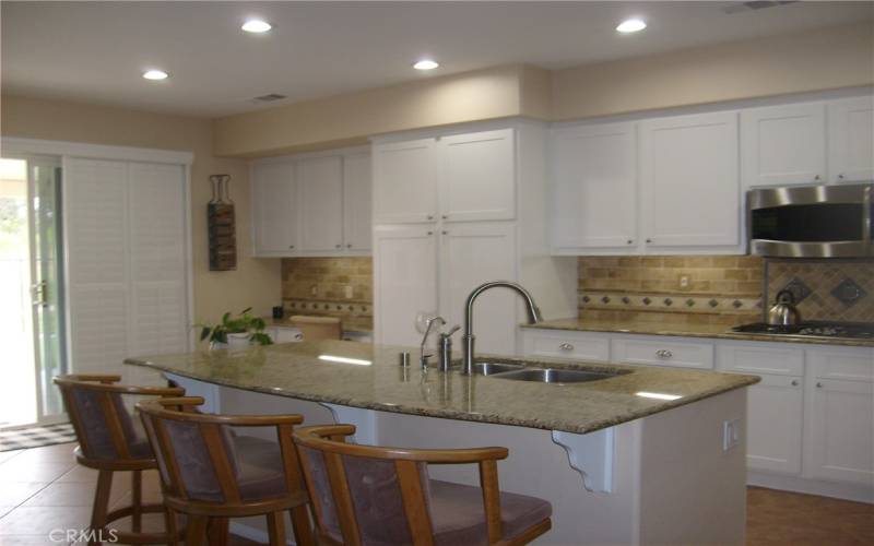 Kitchen With Island Include Stainless Steel Dbl. Sink with Garbage Disposal and Stainless Steel Dishwasher.

Separate Desk Area.