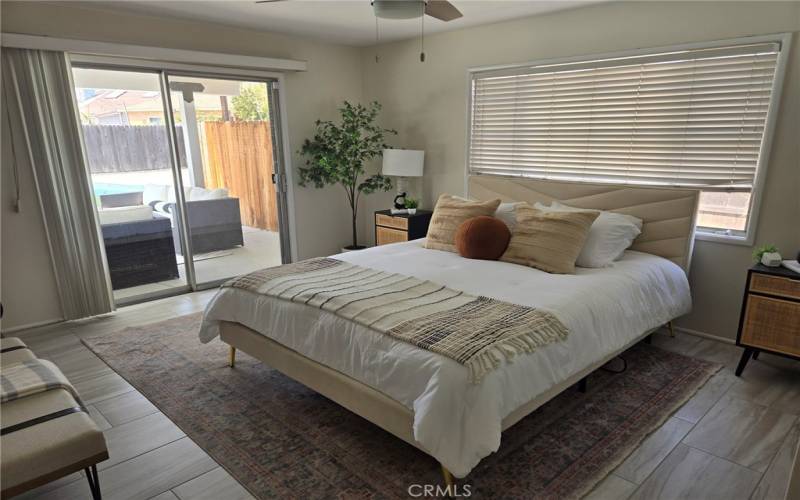 Master Bedroom w/Sliding Doors Leading to Patio and Pool