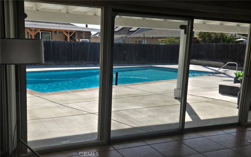 Sliding Doors Leading To Pool from Family Room