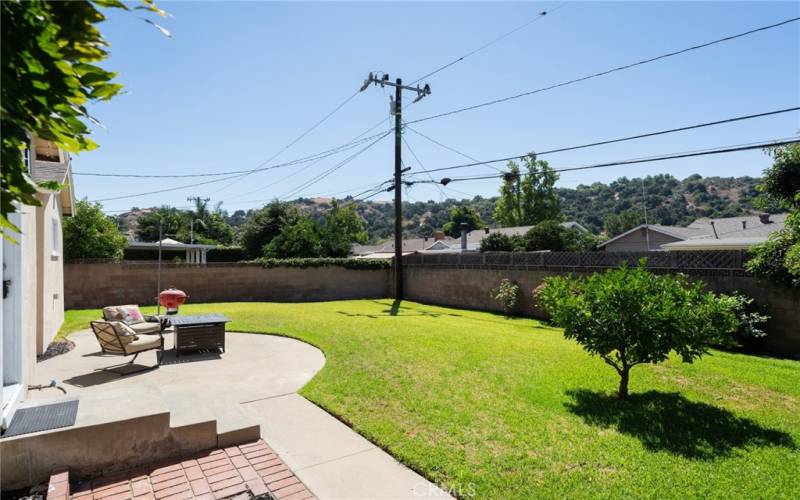 Exit to backyard with hill views