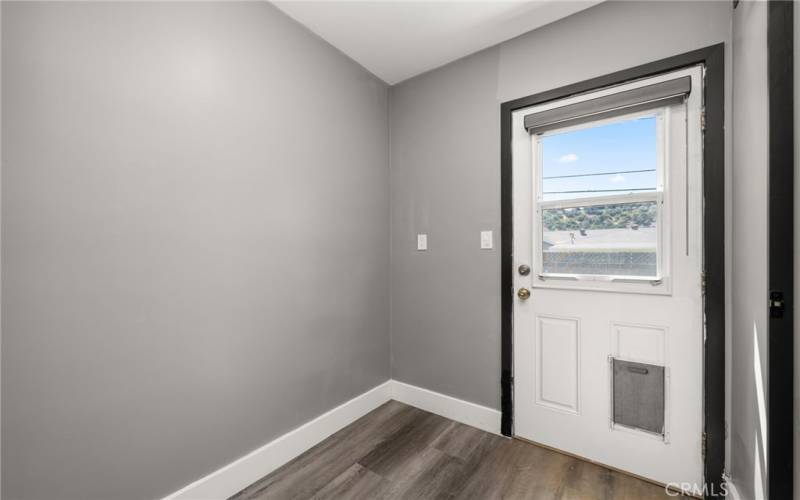 old laundry room next to 1/2 bath, can add shower to this room