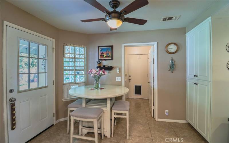 Kitchen area view towards laundry room.