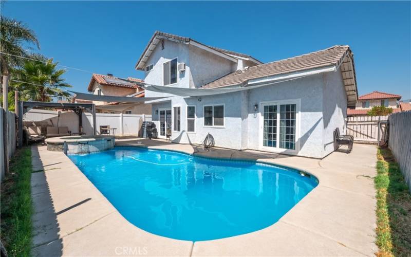 refreshing in ground pool and jacuzzi