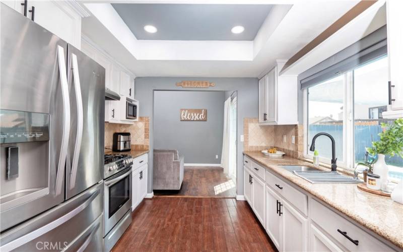 view from family room into kitchen