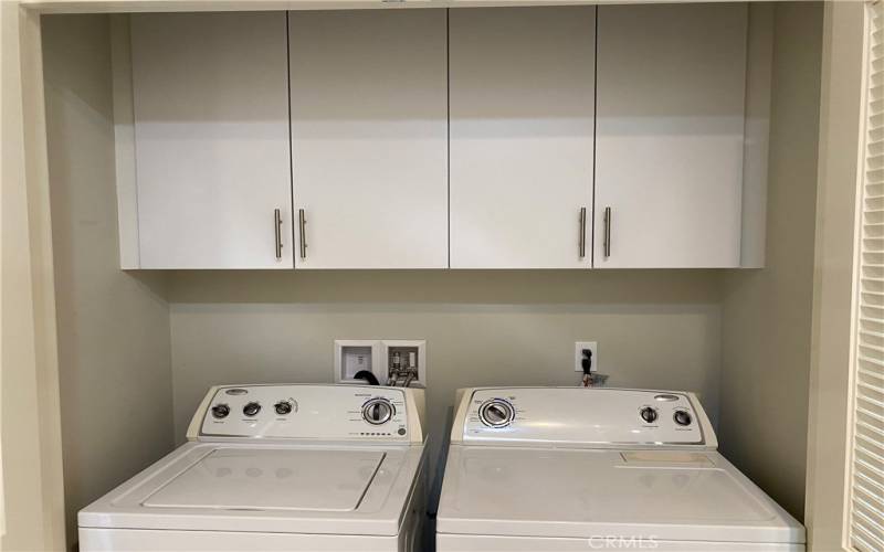 Laundry at the top of the stairs leading to the bedrooms.
