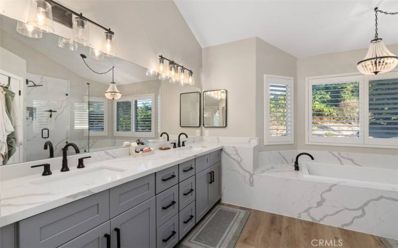 Primary Bathroom Features Quartz Countertops