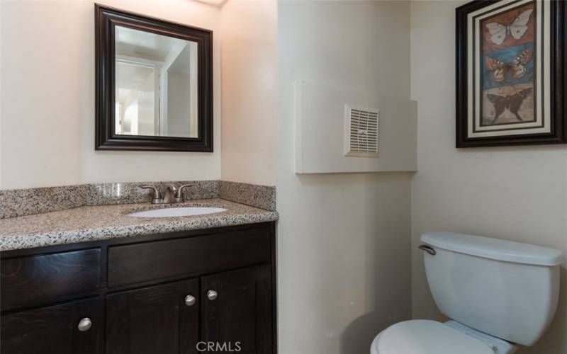 Downstairs guest bathroom next to kitchen