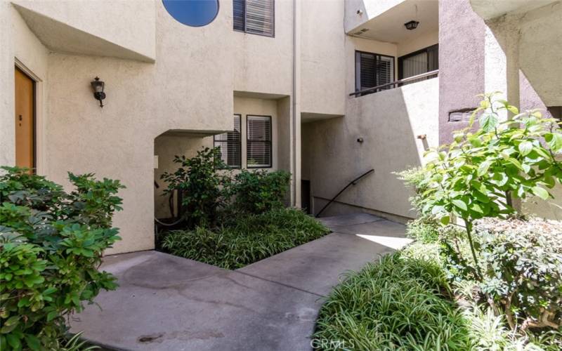 Stairs lead to garage