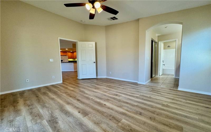 Main bedroom with ensuite and door to family room