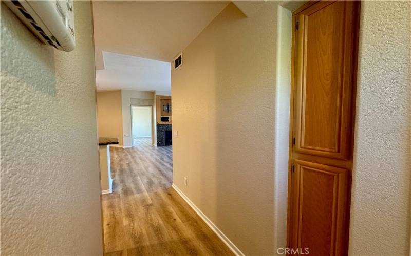 Linen cupboard from 2nd bedroom looking towards fireplace