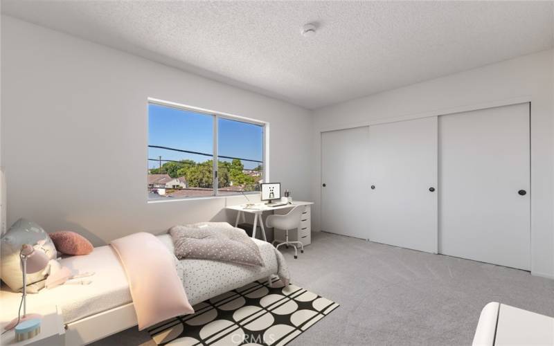 Virtually staged second bedroom with private bath with double closets