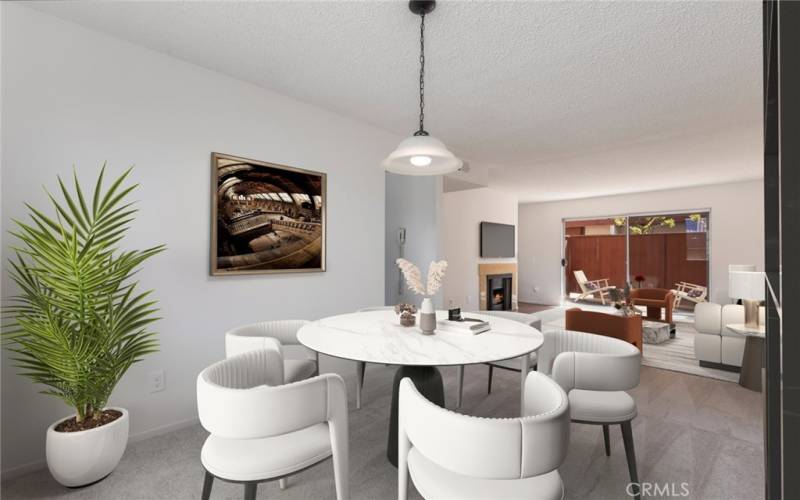 Virtually staged dining-living area flows out to the private patio