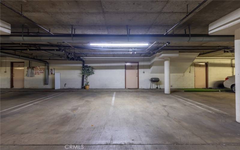 Two parking spaces directly outside of unit entrance from secured, community garage