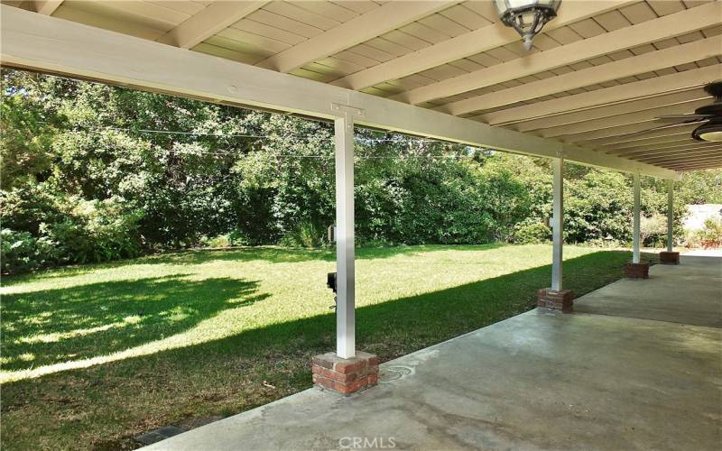 secluded serene backyard perfect for entertaining with a adequate sized side yard