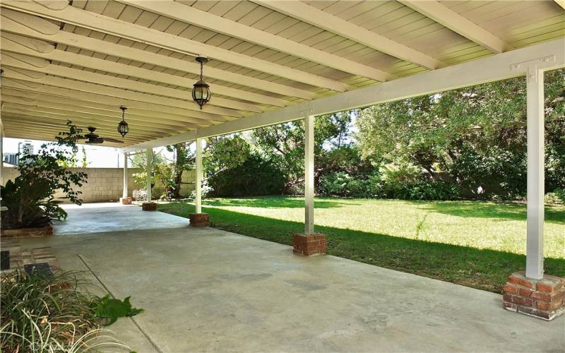 secluded serene backyard perfect for entertaining with a adequate sized side yard