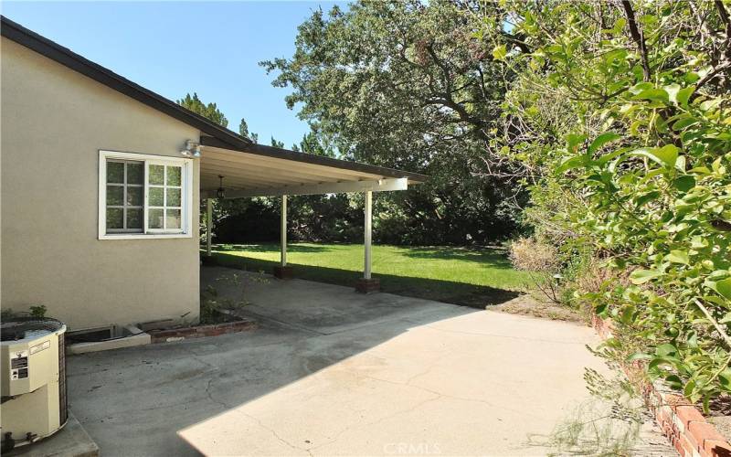 secluded serene backyard perfect for entertaining with a adequate sized side yard