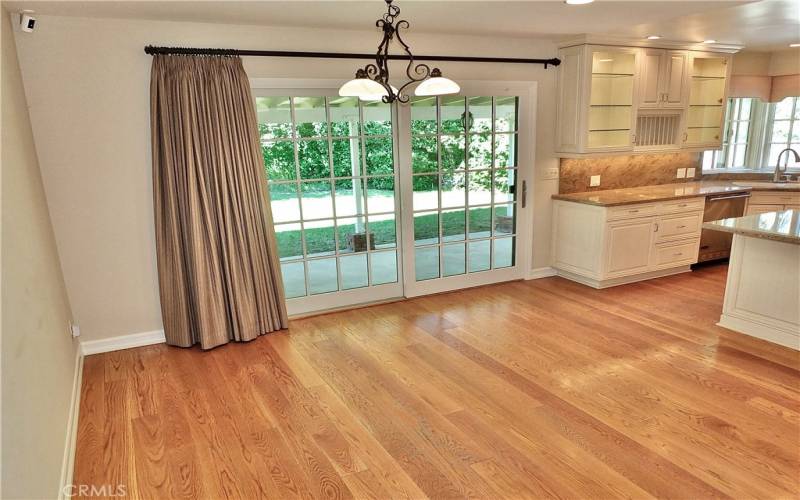 sliding patio door leading to the secluded serene backyard