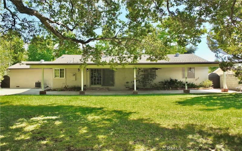 secluded serene backyard perfect for entertaining with a adequate sized side yard