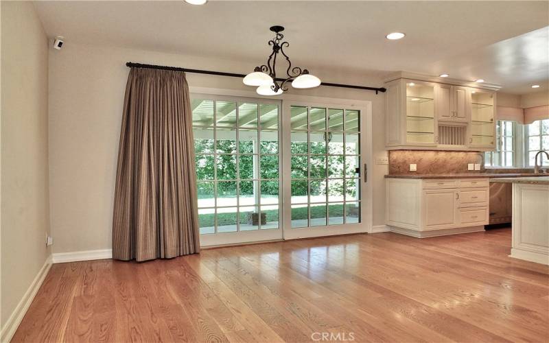 sliding patio door leading to the secluded serene backyard