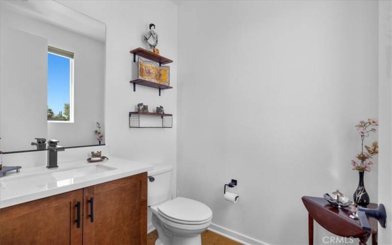 Powder room off of the family room