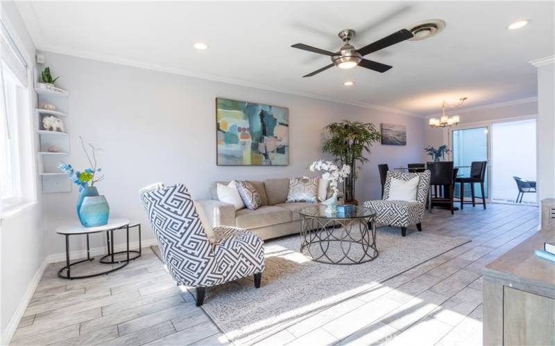 Sunny open living area with tile 