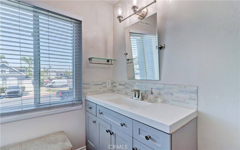 Upstairs bathroom with updated vanity