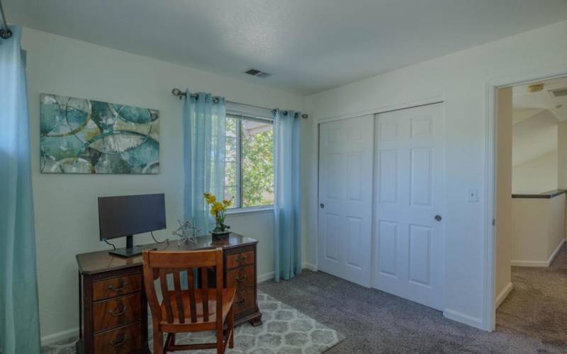 LARGE BEDROOM FEATURING CLOSET ORGANIZERS