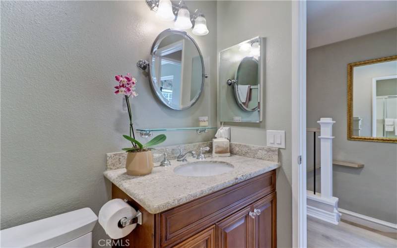 Upgraded vanity with granite counter tops.