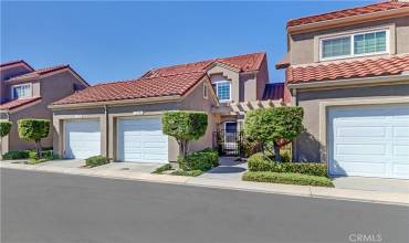 Exterior of the condo showing the one car garage.