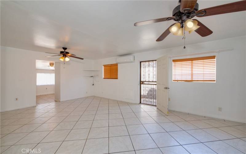 There is one roomy bedroom with it's own entrance. There is also easy access to the laundry and utility rooms through the doorway.