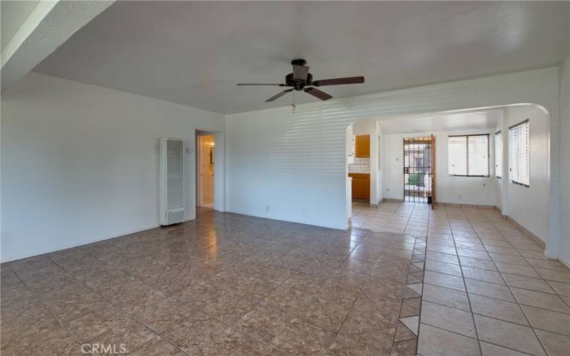 The dining and kitchen areas are straight ahead and the bedrooms are to the left.