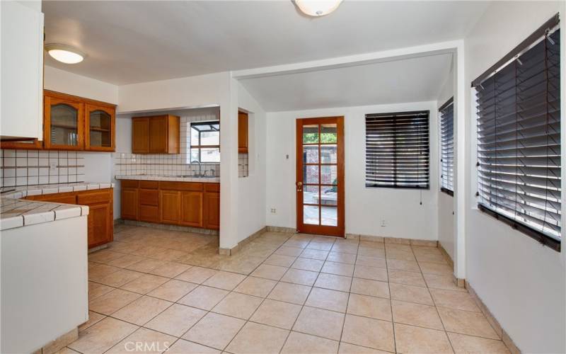 The kitchen is open to the dining room.