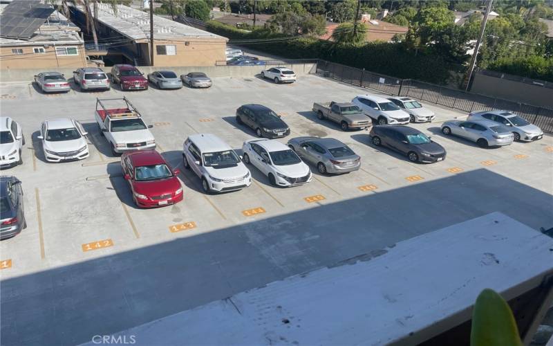 Condo has One assigned parking space on Roof Top #145 can be seen form balcony