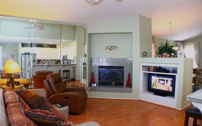 Gas Fireplace with title surround warms up this roomy Family Room