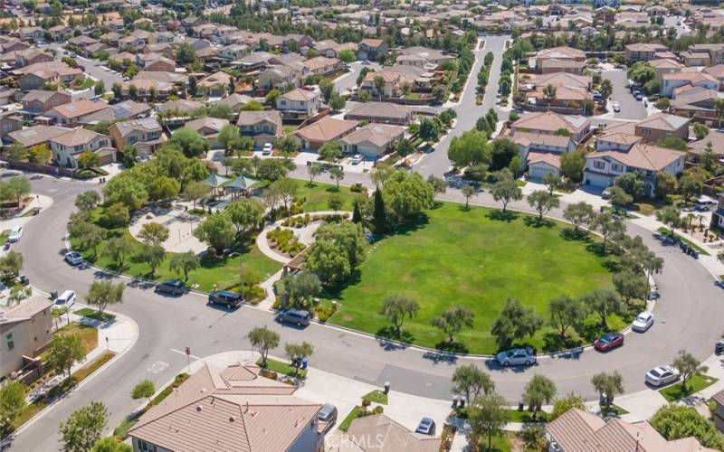 This picturesque neighborhood, with its spacious park and tree-lined streets, offers the perfect place to call home for families seeking tranquility and community.