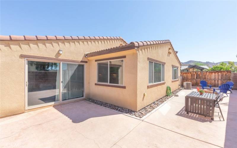 
This outdoor space offers a spacious patio perfect for entertaining, with ample seating and beautiful mountain views.