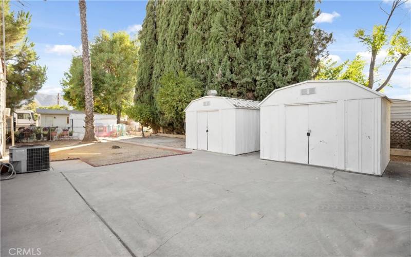 Expansive backyard! 2 sheds included with mature fruit trees.
