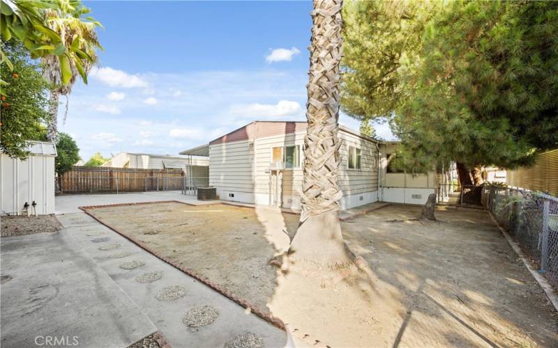 Spacious back yard is fully fenced.
