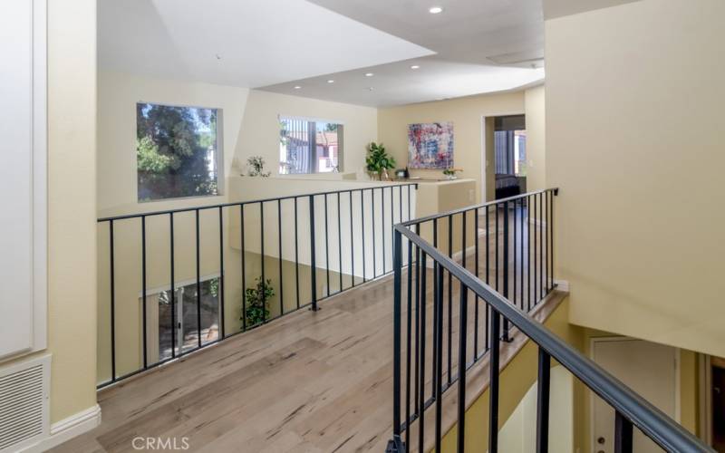 Upstairs hallway to loft and bedrooms 2 & 3