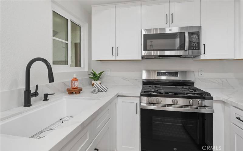 New Kitchen, new appliances, lighting, utility sink
