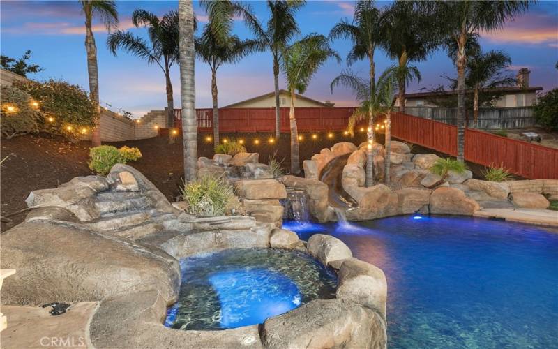 Slide on down to enjoy this pool home!