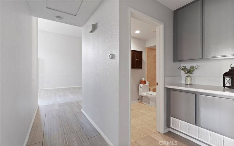 Hallway to living room & hall bath.