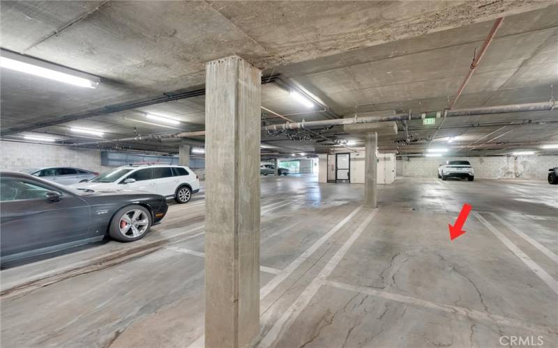 2 car tandem parking in front of elevator. Subterranean gated entry.