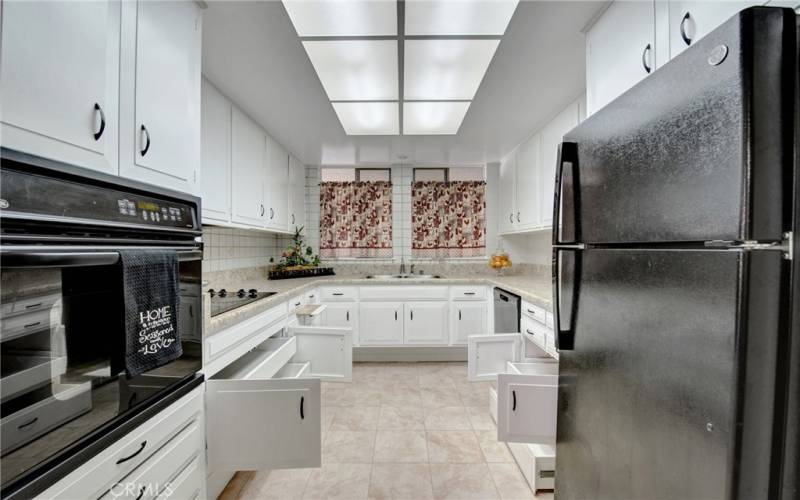 Kitchen showing Pull out drawers in lower kitchen cabinets.